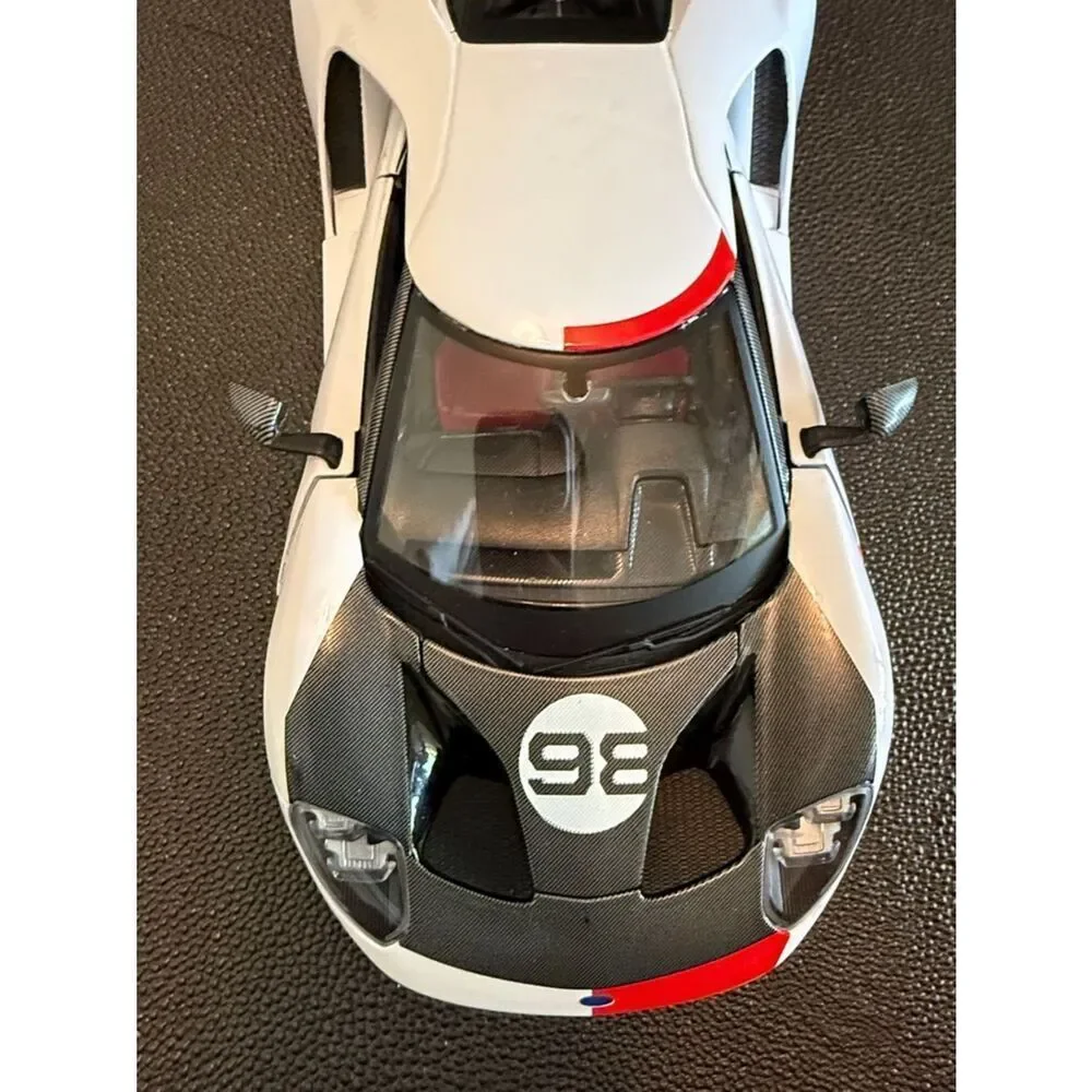 Ford GT # 98 White Heritage Edition Toy Car in White, Black, Red & Gold Maisto